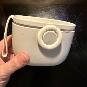 Diaper bag formula container with scoop